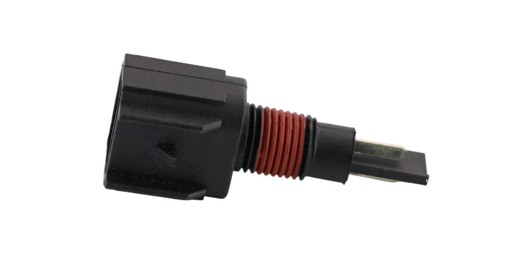 Advance Truck Parts USA Q21-1026S engine coolant level sensor showing a clean studio view of the rectangular connector, threaded body with red o-ring, and probe tip 