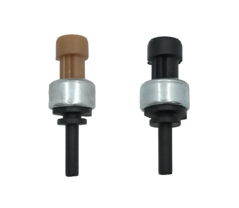 Advance Truck Parts USA Q21-1040 and Q21-1041 PACCAR air pressure switch kit showing a clean studio view of the brown and black sensor pair with metal housings and port stems 