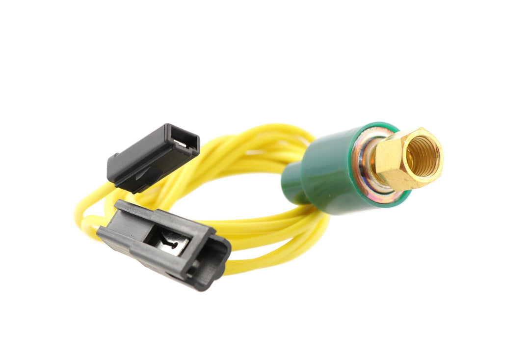 Advance Truck Parts USA W029078 A/C low pressure switch showing a clean studio perspective of the brass threaded fitting, green body, yellow wires, and electrical connectors