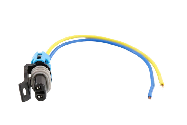 Advance Truck Parts USA W094119 2-pin pigtail connector showing a clean studio view of the black plug housing, blue lock, weather seal, and yellow and blue wire leads on a plain white background