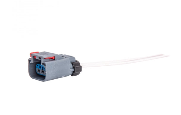 Advance Truck Parts USA W094230 3-wire pressure sensor pigtail connector showing the gray terminal housing, red locking tab, blue internal face, and white wire leads