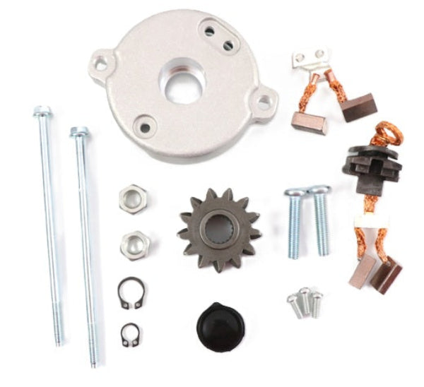 Advance Truck Parts USA WRK1100 Pontiac starter PMGR repair kit showing a top-down studio view of the back cover, drive gear, carbon brushes, bolts, and snap rings