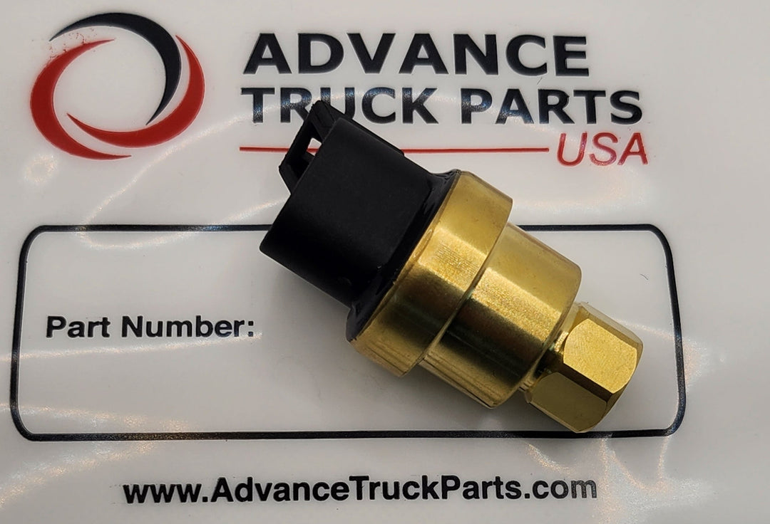 Advance Truck Parts USA 161-1704 Caterpillar pressure sensor showing a studio perspective of the brass housing and electrical connector