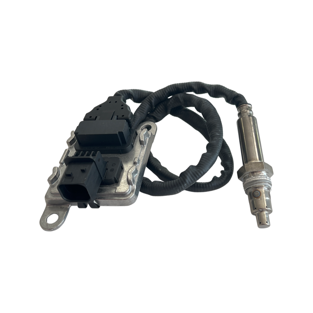 Advance Truck Parts USA 2872942 Cummins nitrogen oxide sensor showing a close-up studio perspective of the electronic control unit, wiring loom, and threaded probe tip