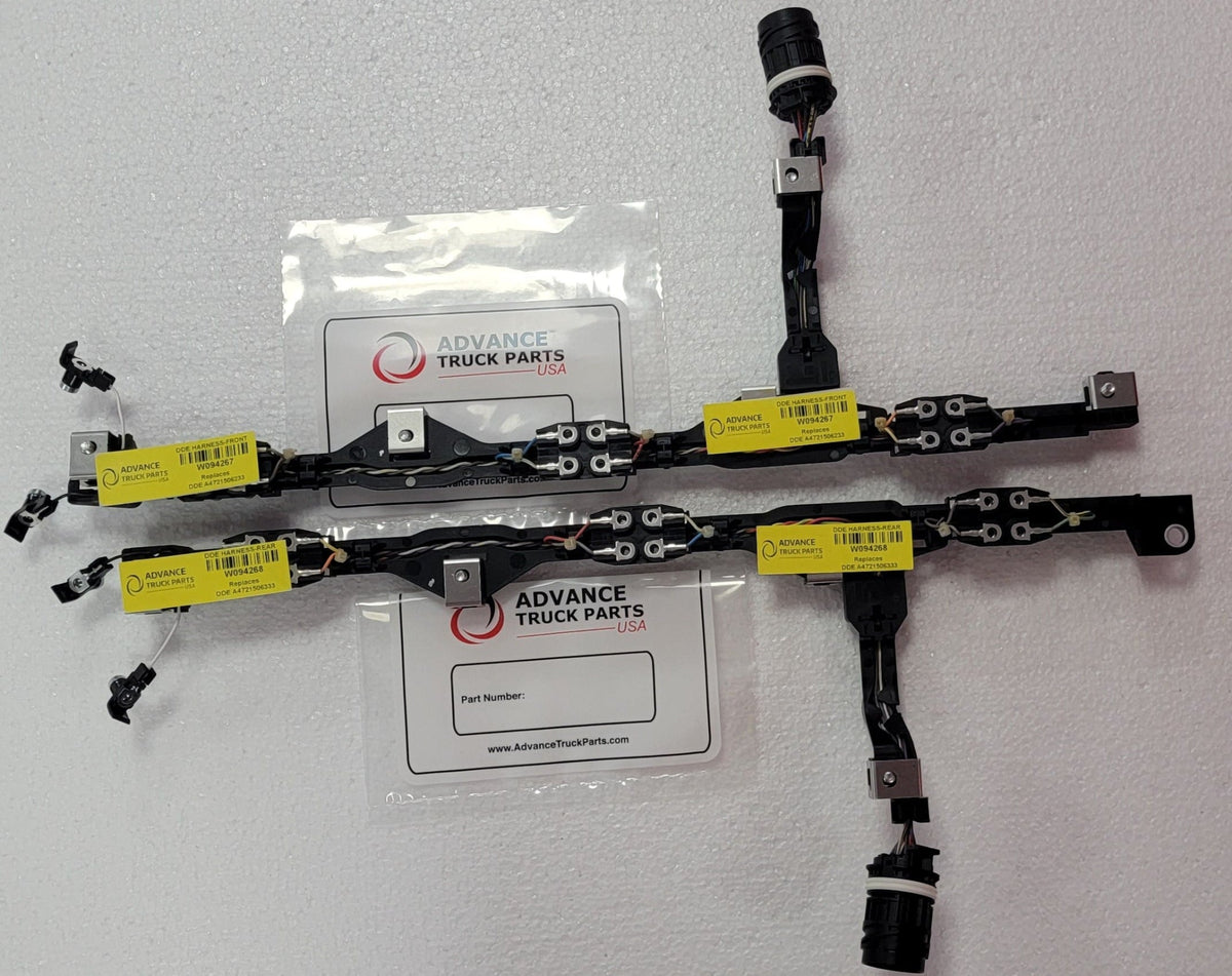 Advance Truck Parts USA DDE A4721506233 Detroit Diesel front fuel injector wiring harness showcasing two black wire loom assemblies featuring multiple connectors, yellow identification tags, and metal mounting brackets resting on branded packaging