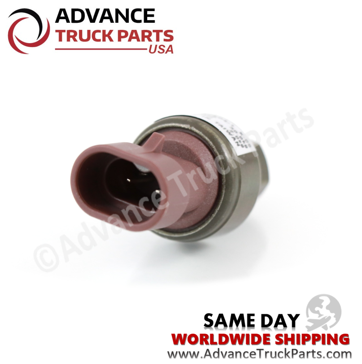 Advance Truck Parts USA branded studio close-up view highlighting the 2-pin brown connector terminal of the Kenworth binary switch