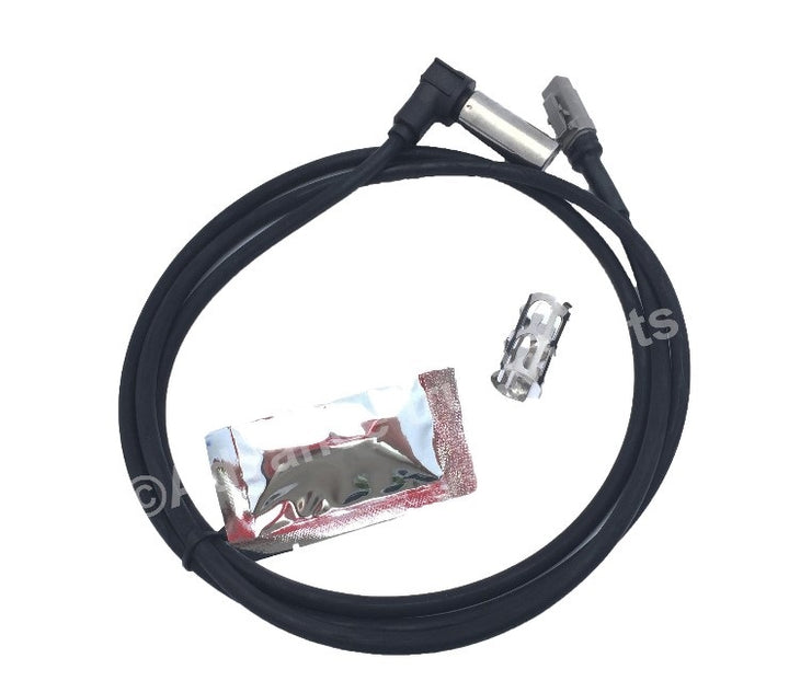 Advance Truck Parts USA right angle ABS sensor kit with 63-inch cable, dielectric grease packet, and sensor mounting clip on a plain background