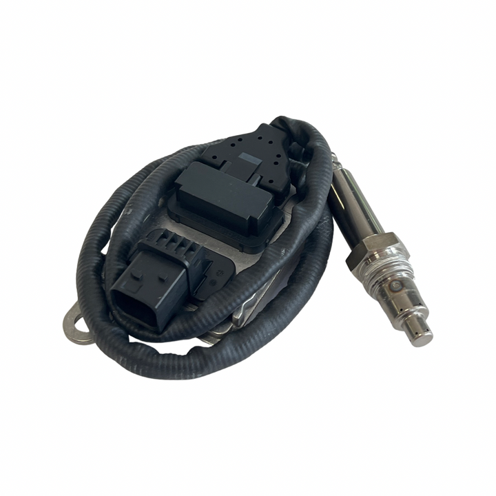 Advance Truck Parts USA 1954664prx nitrogen oxide sensor with heavy-duty cover and coiled harness on a plain background