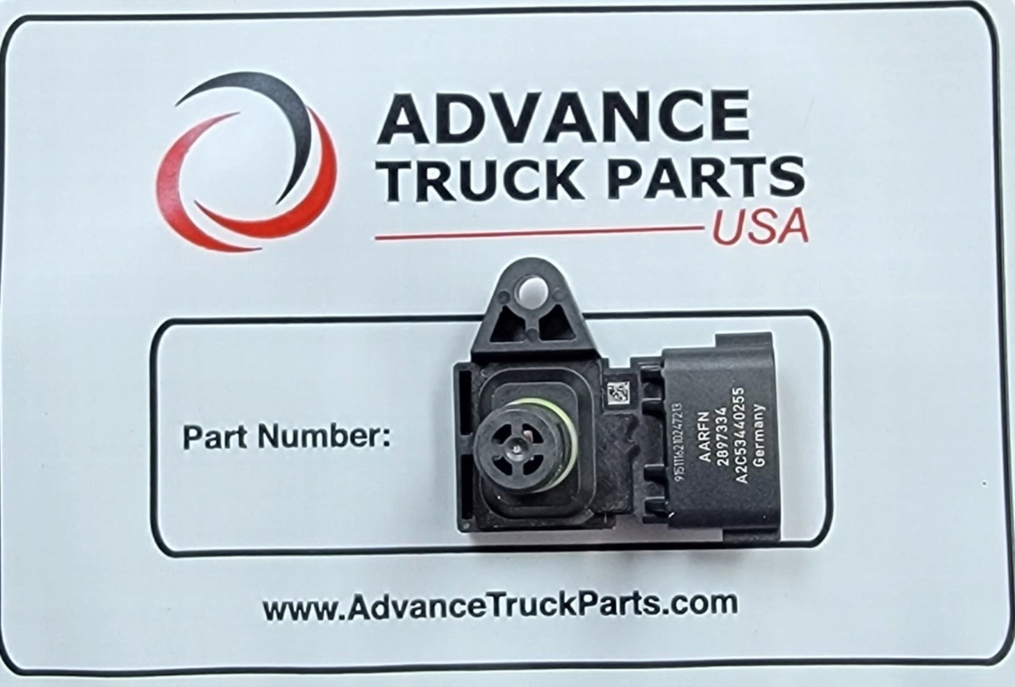 Advance Truck Parts USA 2897334 genuine Cummins air pressure and temperature sensor on a branded display card