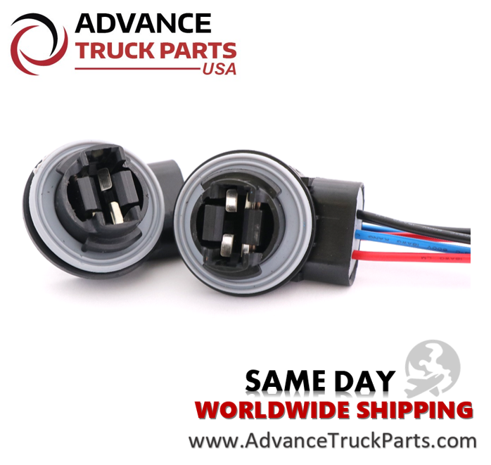 Advance Truck Parts USA 3157 4157 bulb socket harness displaying a studio perspective of the internal metal contacts and wiring on a branded background