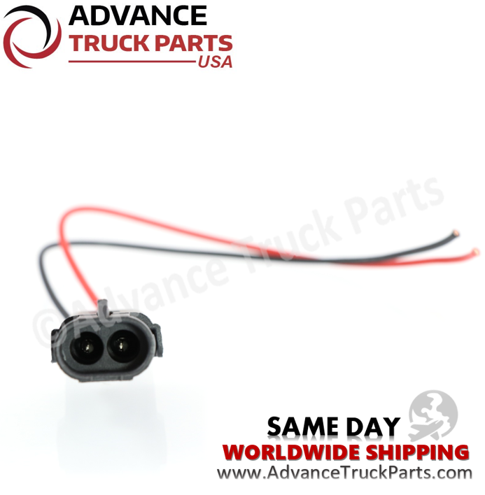 Advance Truck Parts USA 2-pin pigtail connector displaying a direct front-facing studio view of the internal pin terminals and outer shell 