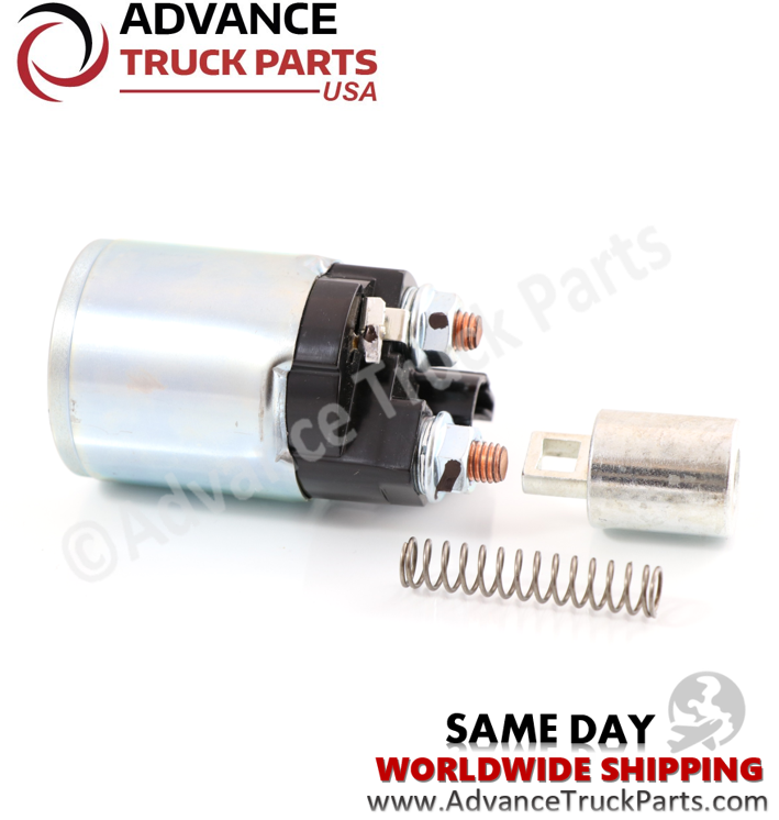 Advance Truck Parts USA Denso starter solenoid displaying an overhead studio layout of the solenoid, plunger, and return spring on a branded background
