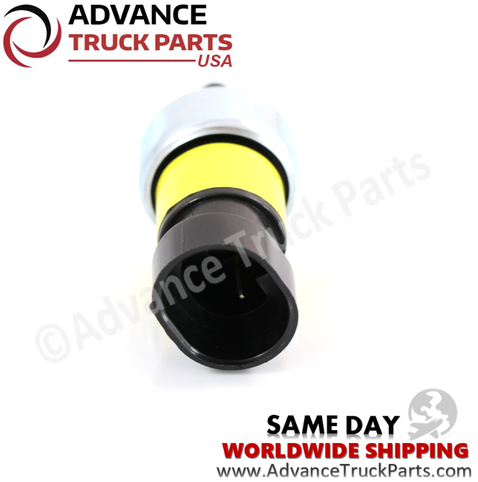 Advance Truck Parts USA Paccar pressure air brake switch displaying a side studio perspective of the black connector housing, yellow middle section, and metal threaded body on a branded background