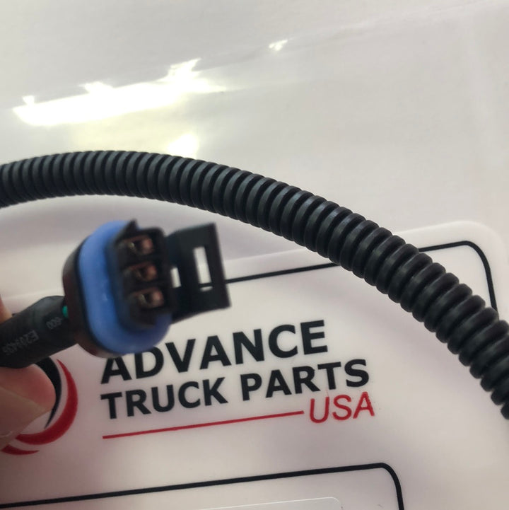 Advance Truck Parts USA branded studio close-up view highlighting the 3-pin connector face and blue weather seal of the W094232 harness