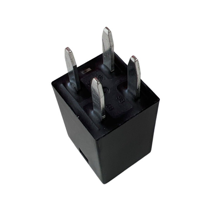 Advance Truck Parts USA studio bottom up perspective of the heavy-duty micro relay highlighting the 4-pin layout and terminal numbers molded into the base