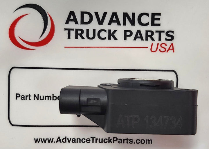 Side profile view of the Advance Truck Parts USA 134734 throttle sensor showing laser-etched part number