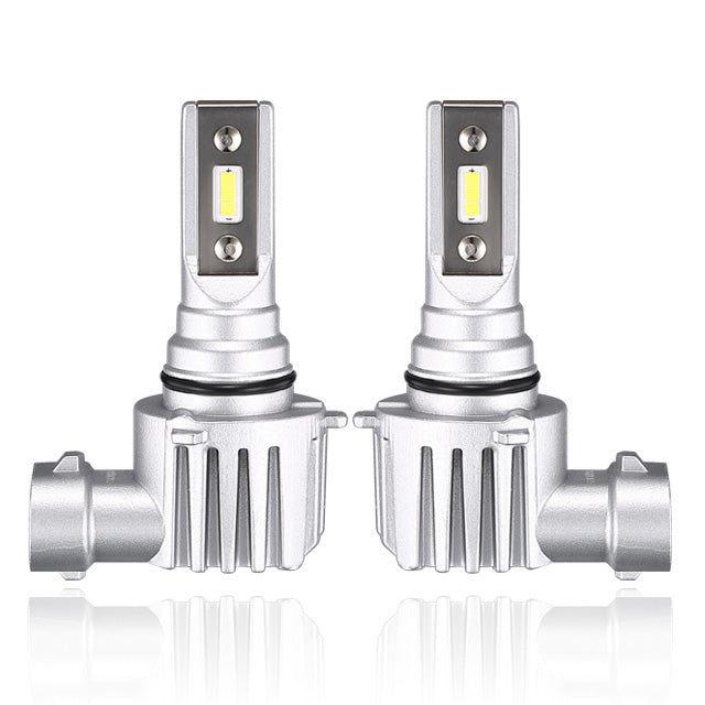 Advance Truck Parts USA Brightest fan-less 9006 LED headlight bulb pair by WSI Electronics showcasing integrated cooling fins and diode chips