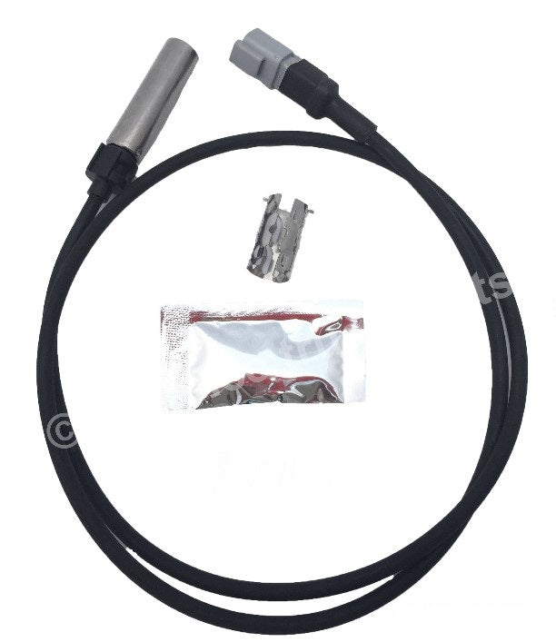 Advance Truck Parts USA branded studio top-down view highlighting the sensor probe tip, connector end, and included accessories of the ABS sensor kit