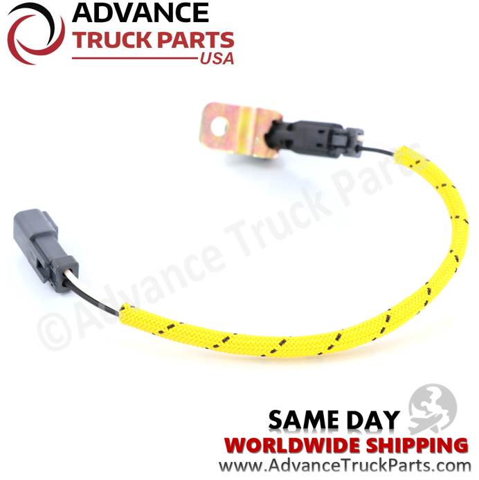 Advance Truck Parts USA Caterpillar speed sensor showing a curved studio layout of the yellow braided cable and connectors on a branded background