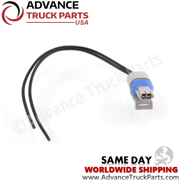 Advance Truck Parts USA branded studio angled horizontal perspective displaying the 2-wire electrical pigtail harness featuring a grey connector body, blue weather seal, and black wiring leads for commercial trucks