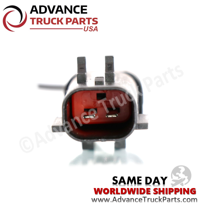 Advance Truck Parts USA end-on view of the 2-pin electrical connector socket showing internal contact blade pins and red seal insert