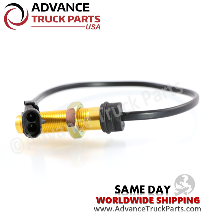 Advance Truck Parts USA branded studio horizontal perspective showcasing the replacement heavy-duty speed sensor featuring a gold-toned aluminum threaded housing, hex nut, and black 2-pin connector for Freightliner commercial trucks