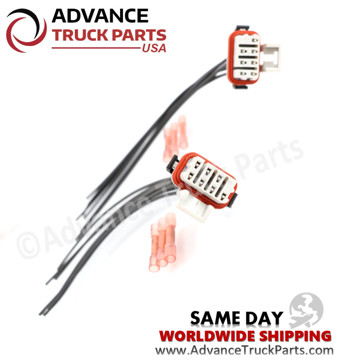 Advance Truck Parts USA branded studio top-down view showcasing the dual headlight wiring harness pigtails and heat shrink connectors