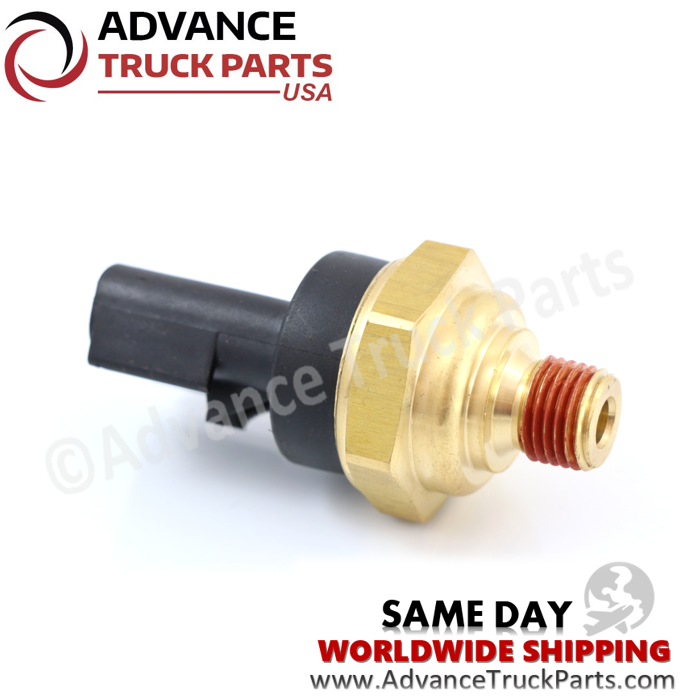 Advance Truck Parts USA studio horizontal right side angled perspective highlighting the brass threaded base with red sealant and black housing of the heavy-duty oil pressure sensor