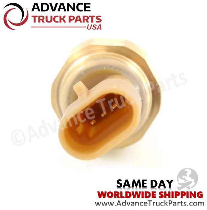 Advance Truck Parts USA branded studio close-up perspective displaying the replacement intake manifold pressure sensor featuring the tan 3-pin electrical socket, internal metal contact terminals, and brass metallic housing for commercial vehicles