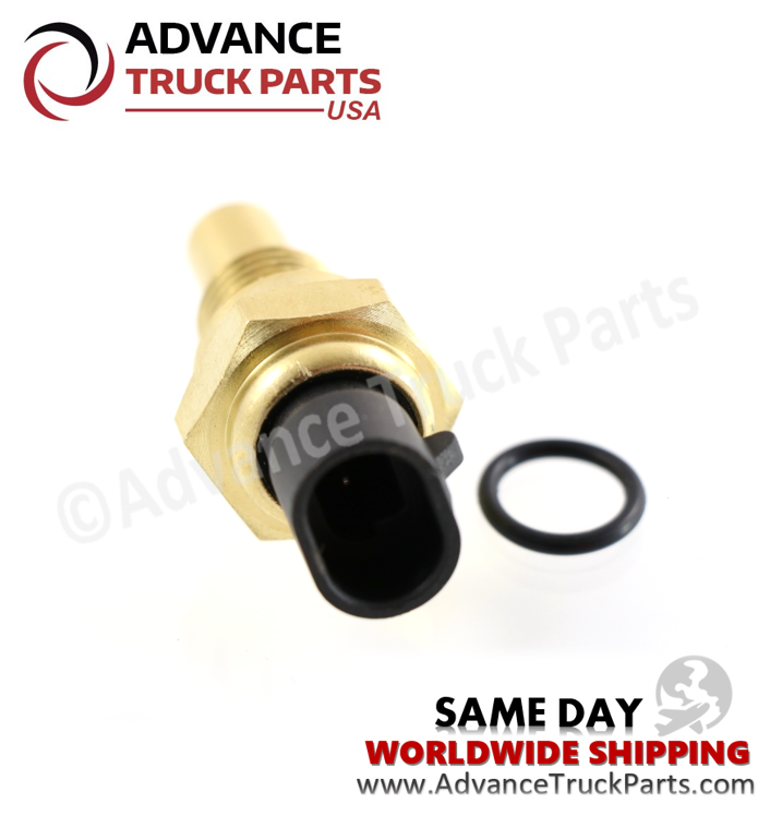 Advance Truck Parts USA branded studio angled top perspective displaying the replacement temperature sender sensor featuring the black electrical socket, internal metal contact terminals, brass hex housing, and separate black O-ring