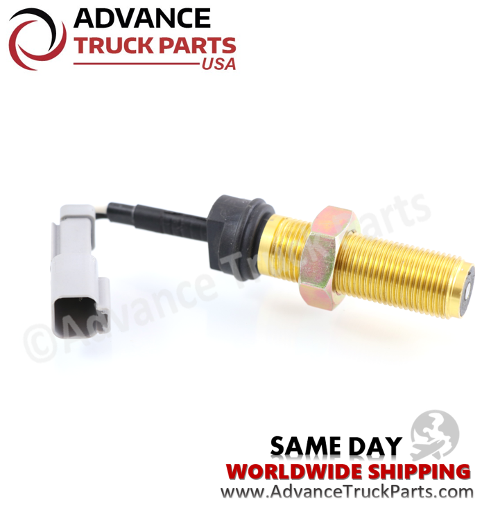 Advance Truck Parts USA speed sensor displaying a full-length side profile highlighting the 3/4-16 threaded brass housing, securing nut, and the grey electrical connector