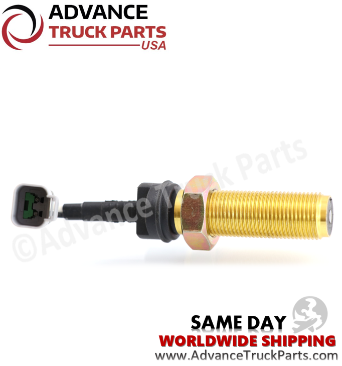 Advance Truck Parts USA speed sensor featuring a profile view angled to show the internal terminals of the grey 2-pin electrical connector and the sensing tip of the brass body
