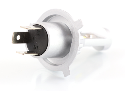 Advance Truck Parts USA H4 HL LED headlight bulb displaying the rear 3-prong electrical terminal layout