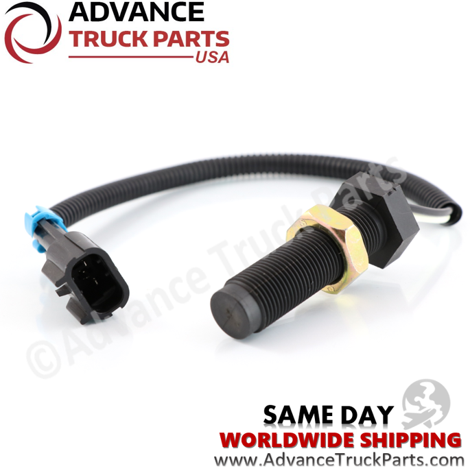 Advance Truck Parts USA branded studio angled perspective showcasing the 2-pin Mack transmission speed sensor highlighting the black electrical connector housing, locking mechanism, and threaded probe body