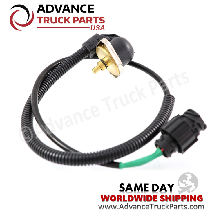 Advance Truck Parts USA branded studio angled perspective showcasing the heavy-duty boost pressure and temperature sensor highlighting the brass sensing tip, black sealing O-ring, metal mounting bracket, and circular electrical plug for Mack and Volvo commercial trucks