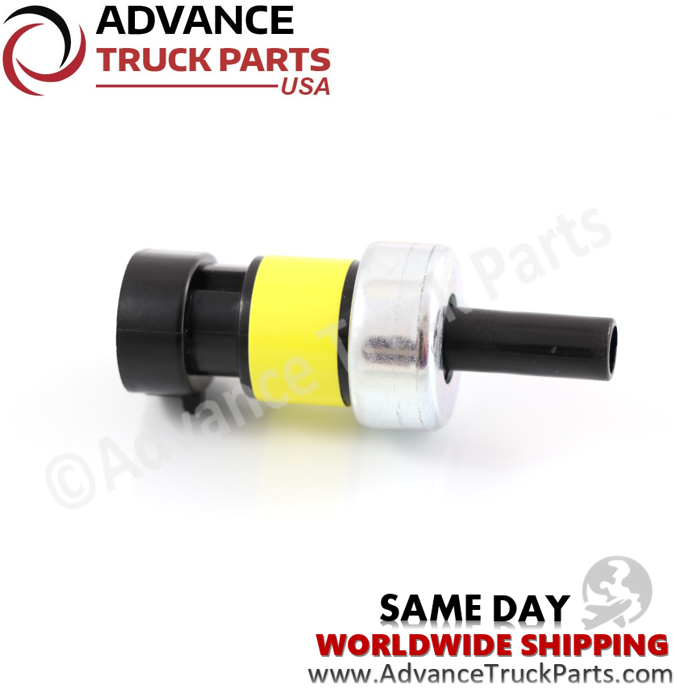 Advance Truck Parts USA branded studio side profile featuring the replacement pressure switch unit displaying the black connector housing, yellow stripe ring, and smooth port stem for International ProStar and 7600 models