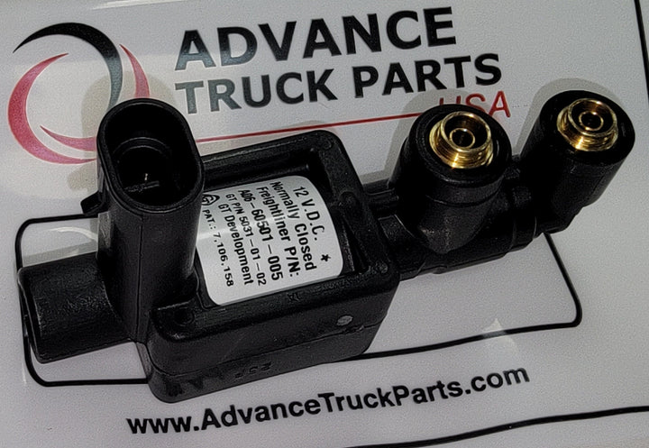 Advance Truck Parts USA branded studio angled view highlighting the electrical connector and brass ports of the valve