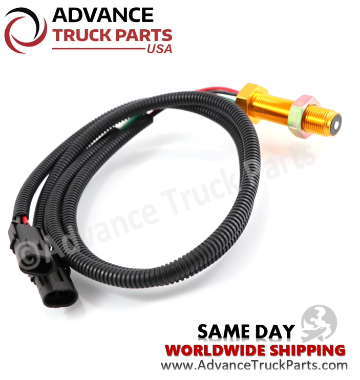 Advance Truck Parts USA branded studio angled view highlighting the threaded sensor probe and dual connector setup of the International speed sensor