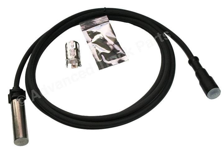 TDA R955608 straight ABS sensor assembly with cable harness, metal retaining clip, and grease packet on a plain background