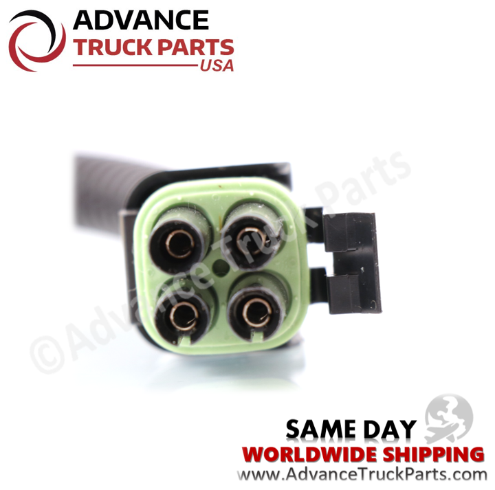 Advance Truck Parts USA branded studio close-up perspective highlighting the electrical connection of the heavy-duty fan timer switch featuring the black plastic connector housing, light green weather seal, and internal metallic contact terminals