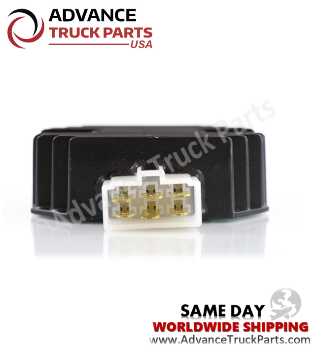 Advance Truck Parts USA branded studio angled top perspective displaying the heavy-duty voltage regulator highlighting the rectangular white 6-pin electrical socket and internal brass contact terminals