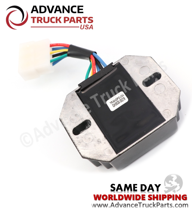 Advance Truck Parts USA Kokusan Denki voltage regulator showing a studio perspective of the bottom mounting plate and electrical wiring on a branded background