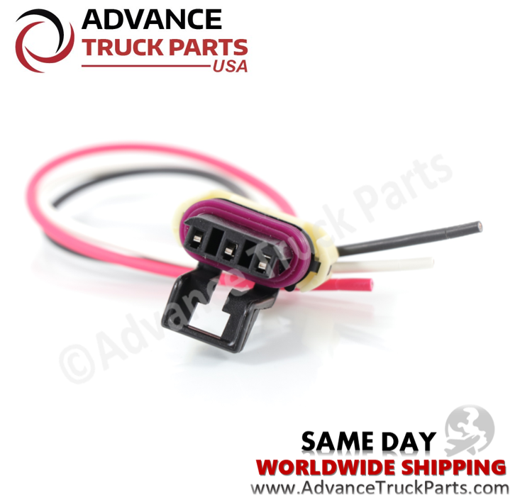 Advance Truck Parts branded studio close-up view showing the internal terminal pins and purple rubber seal of the W094112 connector
