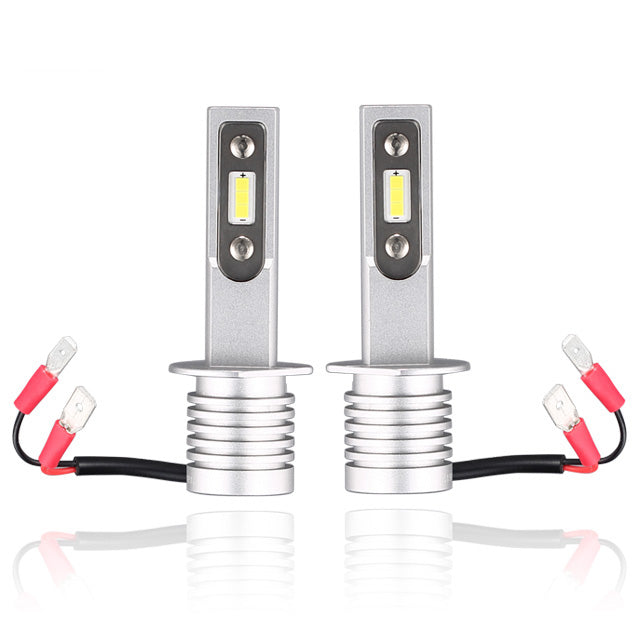WSI Electronics Brightest H1 LED headlight bulb set showing a studio view of the two fan-less LED bulbs with silver heat sinks, diode chips, and wiring connectors