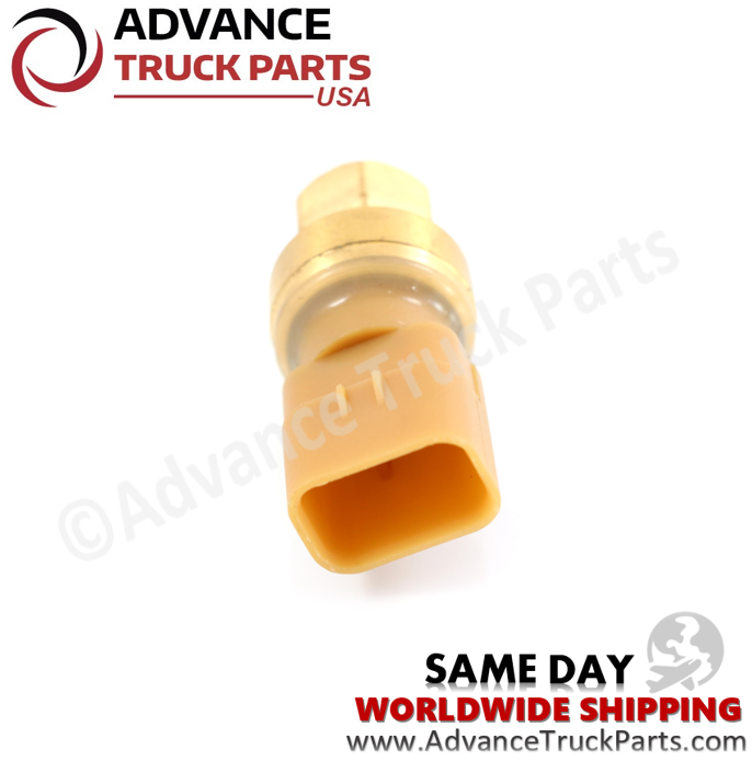 Advance Truck Parts USA branded studio close-up view highlighting the rectangular pin opening of the tan connector housing on the Caterpillar pressure sensor