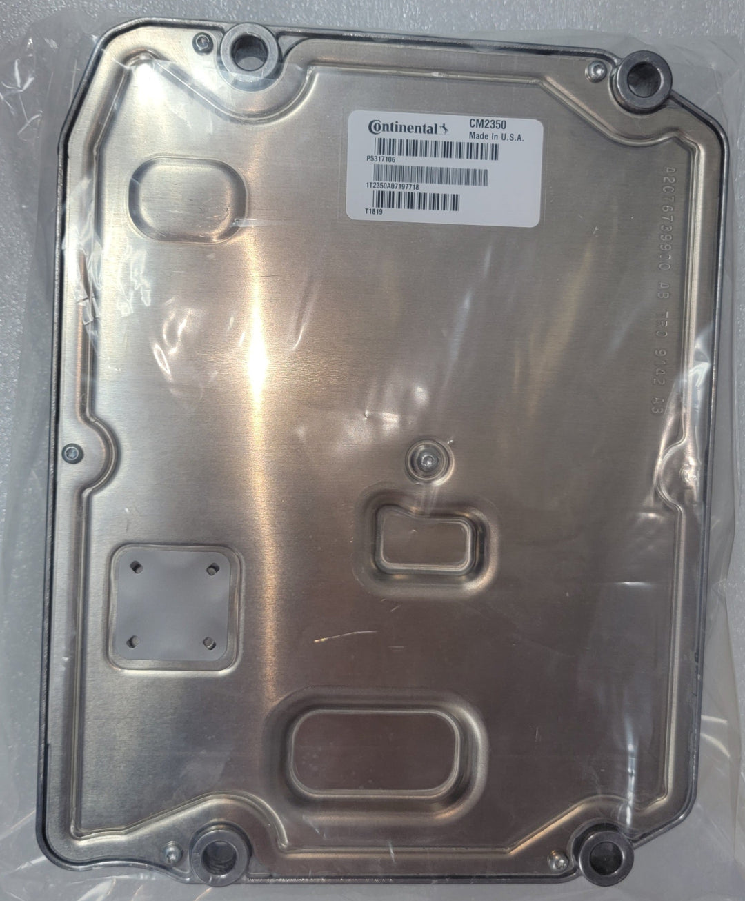 Packaged genuine Cummins 5317106 ECM showing rear metal casing