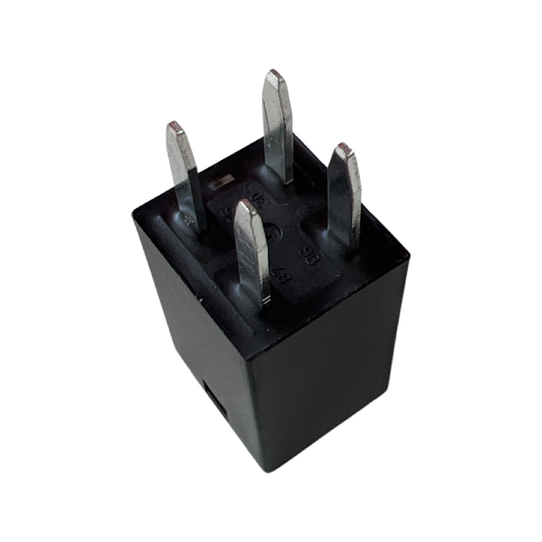 Song Chuan 303-1AH-S-R1-U01-12VDC automotive micro relay showing an upward angled view of the four metal terminal pins and black housing on a plain white background