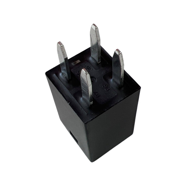 Song Chuan 303-1AH-S-R1-U01-12VDC automotive micro relay showing an upward angled view of the four metal terminal pins and black housing on a plain white background