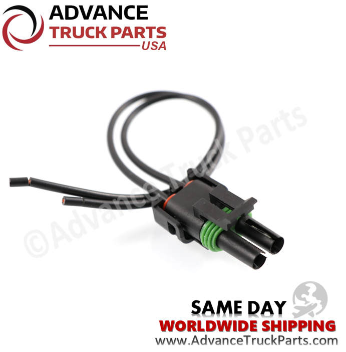 Advance Truck Parts USA W09430 2-pin pigtail connector showing the black housing, green weather seals, locking tab, and AWG 18 wire leads